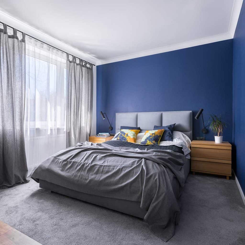 Phòng ngủ cá tính với tone màu xám xanh làm chủ đạo